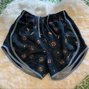 Blue and orange floral NIKE workout shorts